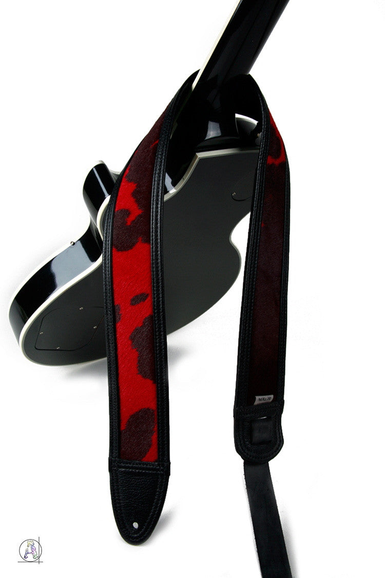 Red Hair on Calf in Black Leather