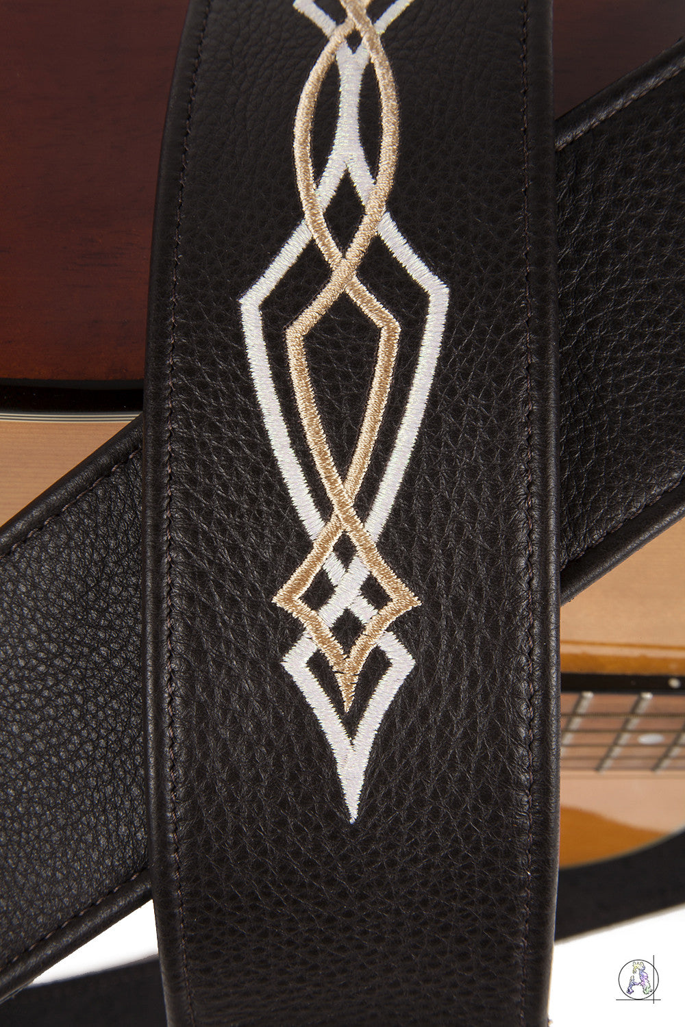 Pearl and Gold Pinstriping on Dark Brown Leather
